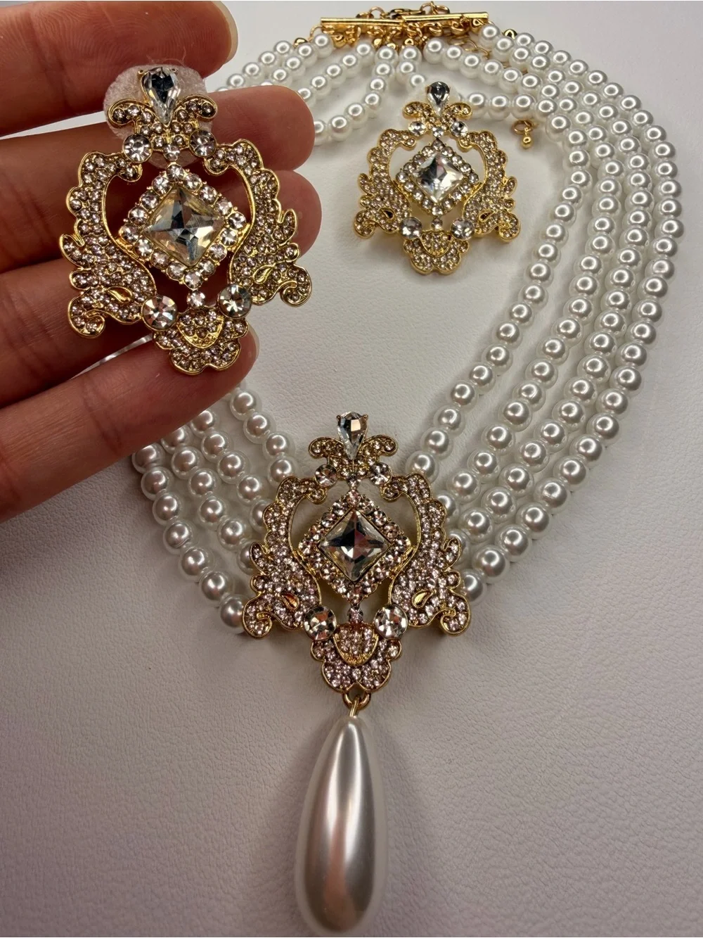 White Pearl Multi-Strand Necklace and Earring set with Gold and Crystal Pendant